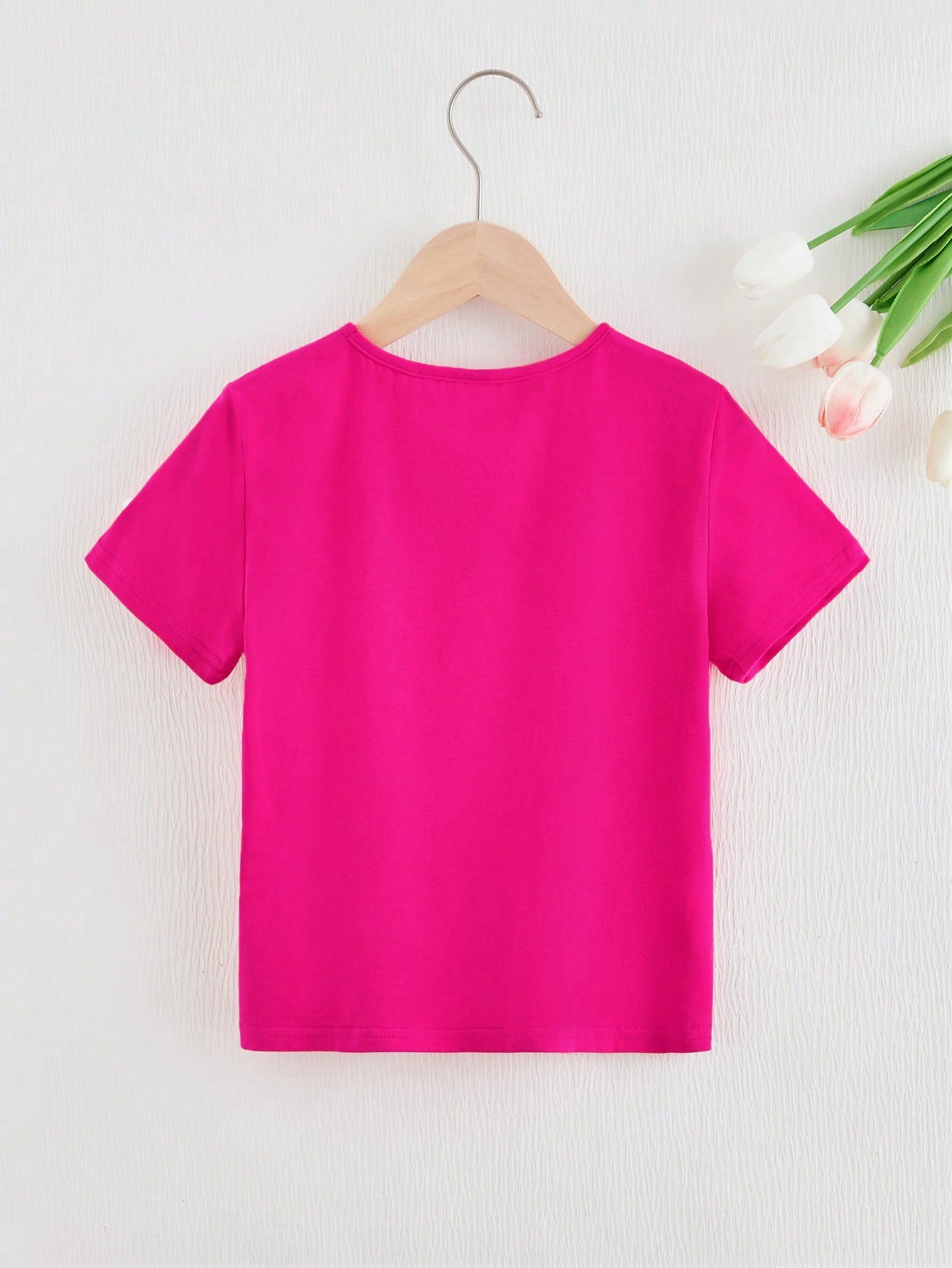 Knitted Pink T-shirt for Toddler Girls, Adorned with Pearl-Studded Hem and Bow Tie Detail